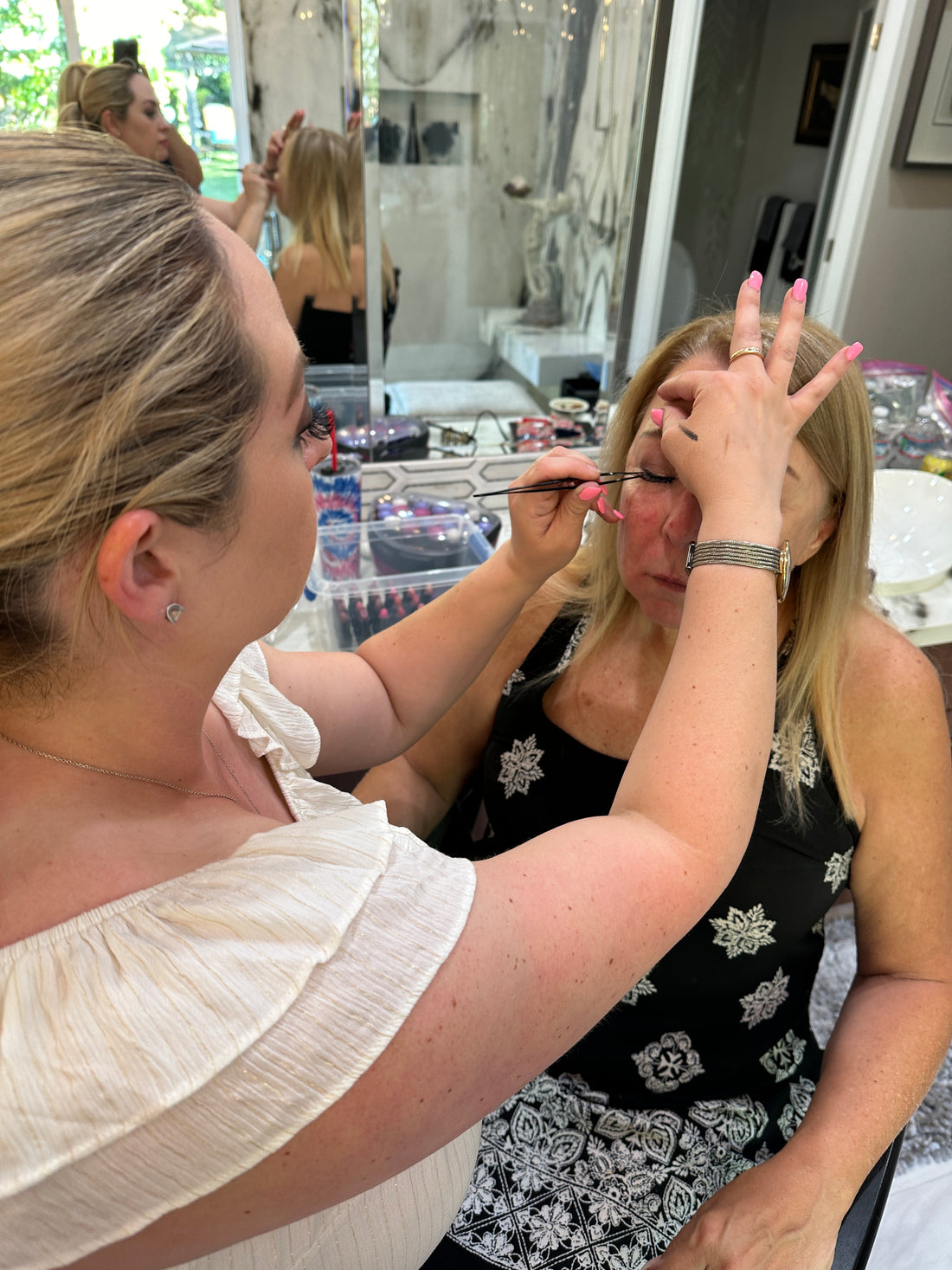 Sarah Applying Makeup to a woman